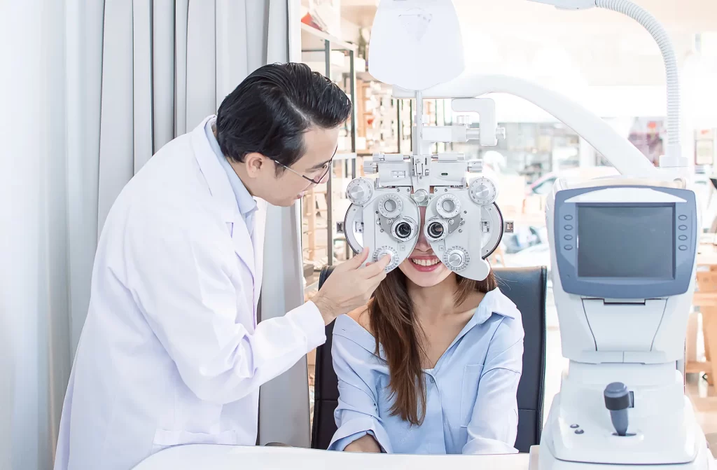Doctor performing an eye test on a patient using diagnostic machine