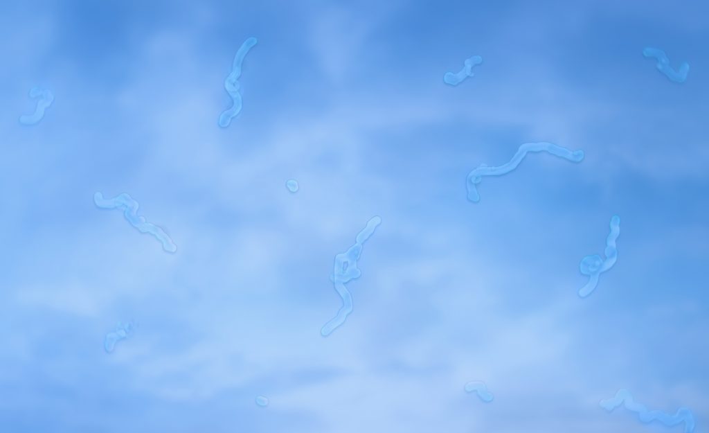 Microscopic view of eye floaters drifting in the vitreous, a symptom that may indicate retinal issues requiring retinal detachment surgery.