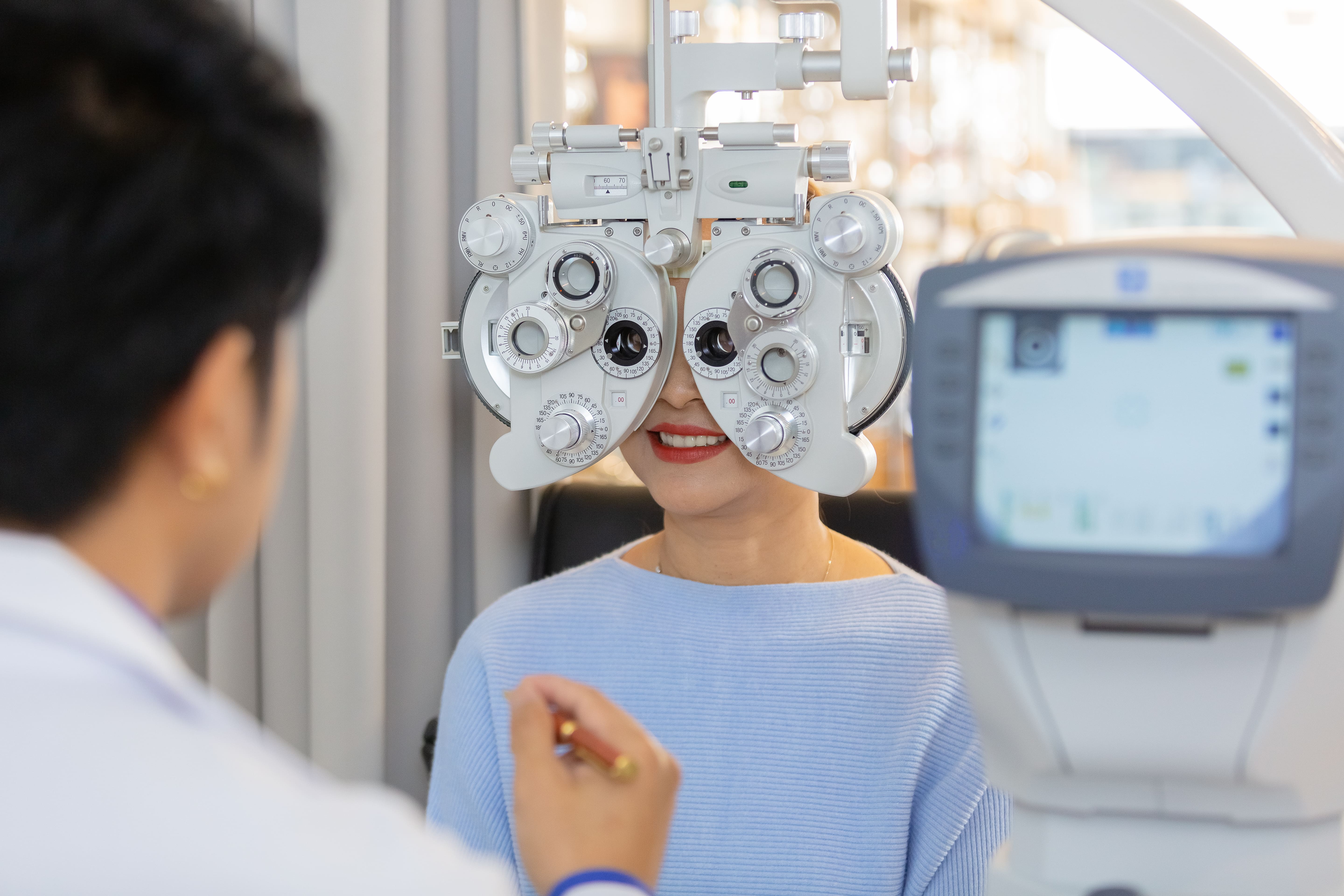 A woman at an eye check-up with a eye specialist in Singapore